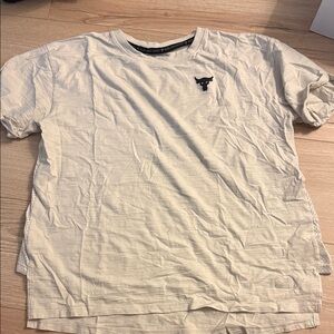 Womens Under Armour beige shirt size M
